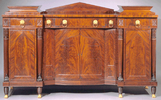 Scholarship has been slowed by the scarcity of marked furniture Made by Joseph B Barry of Philadelphia in 1813 this mahogany sideboard with giltbrass paw feet and lionhead handles is signed and dated by the craftsman on the underside of the bottle carousel in its right cabinet The basis for Barry attributions at Winterthur the Columbus Museum of Art and the Utah Museum of Art this piece made early in the American Gothic period applies Egyptian and Gothic Revival elements to a neoclassical design Courtesy Hirschl amp Adler Galleries