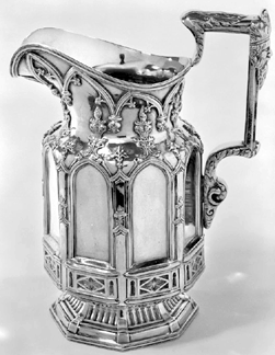 American silver in the Gothic taste is extremely rare This pitcher from a set that included a second pitcher and two matching goblets was made by Zalmon Bostwick of New York in 1845 for John W Livingston who presented it to his soninlaw New York auctioneer Joseph Sampson Bostwicks design was probably drawn from an English stoneware Apostles jug first made by Charles Meigh and copied by Daniel Greatbach of the American Pottery Manufacturing Company of New Jersey Courtesy Brooklyn Museum New York gift of the estate of May S Kelley by exchange