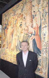 Paris dealer Frank Laverdin Boccara with his 1 million Sixteenth Century tapestry