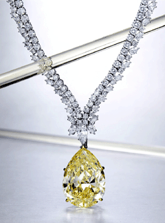 A fancy intense yellow VS1 diamond pendant necklace of 4213 carats by Harry Winston 2032000