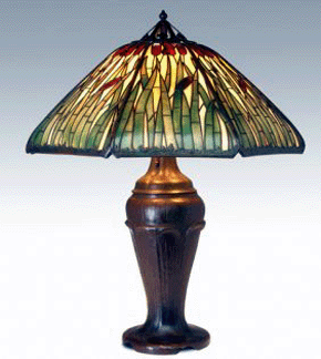 A Handel table lamp with a slagglass shade that was cataloged as an excellent example in marvelous condition commanded a price of 51000