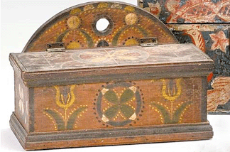 A Nineteenth Century painted and incised salt box reached 86040 against an estimate of 68000
