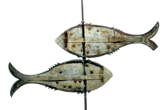 Pisces a painted weathervane of two sheetiron fish that swim in opposite directions late Nineteenth Century Courtesy Shelburne Museum