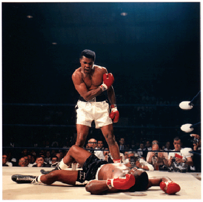 Neil Leifers Ali versus Liston 1965 one of the most famous boxing pictures of all time shows the triumphant Muhammad Ali gloating over his prostrate opponent the formidable Sonny Liston who has just been knocked out in the first round by the celebrated phantom punch in Lewiston Maine Sports Illustrated Neil Leifer