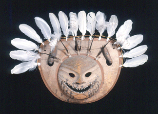 Nepcetat mask central Yupik probably lower Yukon River Alaska Wood feathers fox teeth sealskin thong reed blood blue pigment ochre charcoal teeth Thaw collection Fenimore Art Museum