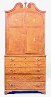 Its likely to end up back home said Owingsville Ky dealer Walter Bailey the underbidder on behalf of a private collector for this Federal cherry inlaid desk and bookcase 127000 3050000 from Kentucky Documented in MESDA files by Brad Rauschenberg and Frank Horton and published in an article on Kentucky furniture in The Magazine Antiques the eagle and trailing vine inlaid piece is inscribed with the name of George Carlyle