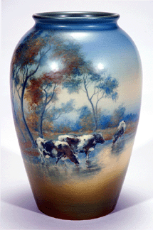Rare Scenic Vellum Rookwood vase showing cows in a stream was bid to 36225 against a presale estimate of 1316000