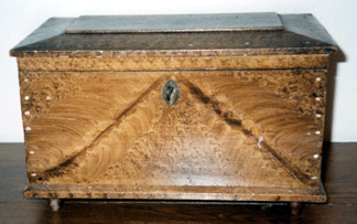 Sewing chest in the collection of the great-grandson of the maker, John Palm Boyer. The grain painted decoration is similar to the decoration on Boyer's seed chests. Height, 7 inches. Private collection.