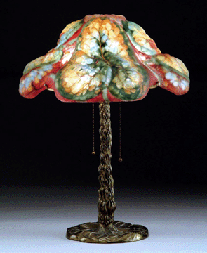 A scarce Pairpoint puffy begonia table lamp came to the block from the collection of Ed and Sheila Malakoff and achieved $51,750.