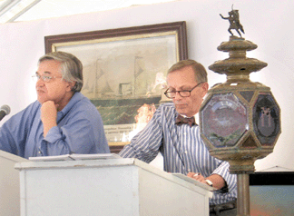 Northeast Auctions president Ron Bourgeault, left, and China Trade expert Carl Crossman presided over the $7.65 million sale in Portsmouth, N.H., on August 20–21. Firefighting antiques included this mid-Nineteenth Century ceremonial brass and glass fire signal, right, with New York State arms, $37,120 ($20/30,000).