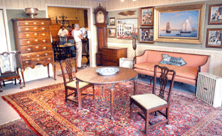 A good selection of merchandise included the William Robert Davis painting that depicted a Nineteenth Century view of masted schooners under sail in Boston Harbor, $63,250; the Elnathan Taber tall case clock that had descended in the family of John Quincy Adams, $48,875; and the highboy at $6,600.