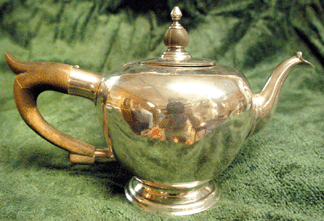 A Jacob Hurd silver teapot led the selection of silver at $41,000. It had been handed from sister to sister through seven generations.