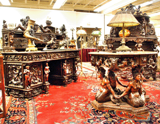 Heavily carved Victorian furniture sold well, with prices ranging from $10,925 for the walnut center table with mermaids to $16,100 for the walnut three-tier sideboard with intricate carved seated putti, lions, seahorses and mermaids.