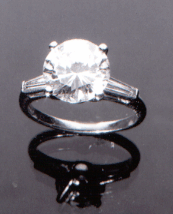 A fourcarat diamond ring sold for 20700 at Weschlers