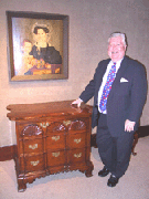 Senior Director Dean Failey with two stars from the various owners sale of January 17 Sheldon Pecks double portrait on panel of Fanny Root Millener and her daughter Frances sold to the phone for 647000 Dealer George Samaha acquired the New London County Conn blockandshell carved chest for 669500 including premium