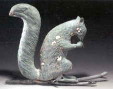 A copper squirrel weathervane attributed to Cushing amp Sons lead the selection of folk art