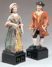 Papiermache figures of a gentleman and lady 30000