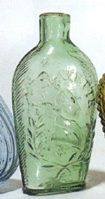 The top lot of the second session was a halfpint Lafayettebust of Lafayette Masonic arch flask in apple green 44000