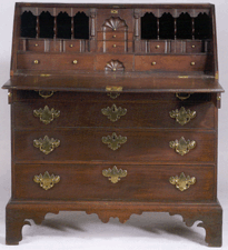 This mahogany slantlid desk is one of three probably from Salem or Marblehead Mass by the same maker It sold to an absentee bidder for 30500