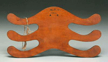 Once exhibited at the Whitney Museum in New York this Shaker cherry garment hanger was stamped on both sides MET 1864 and was carved by Mary E Todd 18521881 It sold for 17000