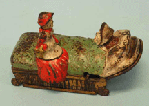 A Lil Red Riding Hood mechanical bank topped the sale at 38500
