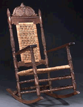 Carved hardwood rocking chair 10450