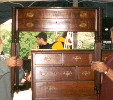 A circa 1810 Massachusetts bowfront Sheraton twodrawer server held aloft sold to dealer Phil Zexter for 11845