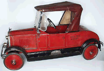 Bought on commission for a Chicago collector this American National Packard electric roadster pedal car from the late 1920s sold for 39600