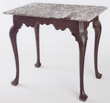 A sideboard table attributed to the shop of Henry Cliffton and Thomas Carteret Philadelphia circa 1755 The table retains its original slab top which appears by color and complex figuring to be from a quarry on the eastern side of the Shuylkill River Photo by Gavin Ashworth