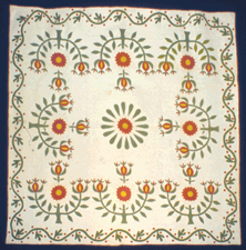 Prairie Rose quilt with medallion center by Eliza J Herron probably Pennsylvania dated 1857 From the collection of the International Quilt Study Center