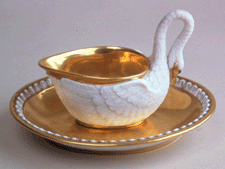 The Creole Empress Josephine kept a flock of swans at the Chateau de Malmaison her favorite residence outside of Paris and used their image on many of her personal possessions This elegant swan cup with saucer was made by the Darte Freres Manufactory famous for Old Paris porcelain from 1801 to 1833 Musee National du Chateau de Malmaison France