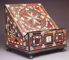 Missal stand Puebla Mexico Seventeenth Century Hardwoods tortoiseshell bone ebony and silver wire The city of Puebla was one of several areas in Mexico that was wellknown for marquetry furniture and objects The eightpointed star on the sides of the missal is the emblem of the Dominican order of friars