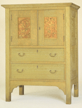 This linen press now on view in the American Wing of the Metropolitan Museum of Art is ornamented with door panels carved with sassafras tree leaves designed by Edna Walker Rick Echelmeyer photo courtesy Robert Edwards