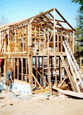 Nineteenth Century barn timbers join Twentieth Century steel channel beams to meet new seismic code requirements