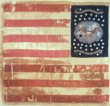 Full view of the CHS Treasury Guard flag after conservation Made of silk by the Philadelphia firm Horstmann Bros in 1864 the flag appears backwards because it was deliberately mounted to display its reverse