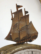 One lighthouse clock has a painted ship finial engraved on the back Steele 1915 apparently indicating clock painted Danny Steele