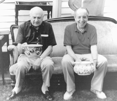 Zeke and Albert Sack not only shared a long and lasting friendship but seemed to also share an interest in the same line of antiques Here they enjoy a fun moment at Carl Nordbloms onsite auction in Peterborough NH 1995