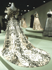 The hourglass shape of this revealing evening costume by Worth 18981900 is accentuated by the almost opart pattern of black silk velvet on a white satin ground The Metropolitan Museum of Art