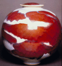 Large globular vase porcelain with copper red with opal blue glaze 14 and one half inches tall