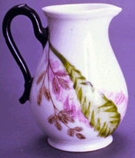 Cream pitcher painted by Thaxter in 1878