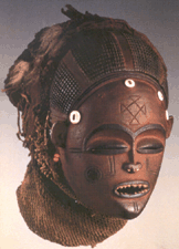 Mask Chokwe peoples Lunda Sul province Angola Twentieth Century Wood buttons beads fiber metal animal hair and pigment