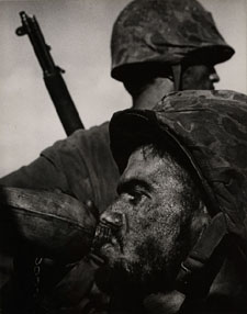 Eugene Smith World War II Marines Saipan Drinking from Canteen 1944 silver print circa 1940s 13516 by 10916 inches signed by the artist with a stylus on recto