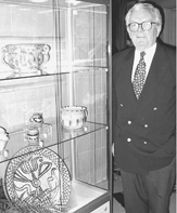 Donald Friary outgoing director of Historic Deerfield with the special loan exhibition of pottery from the museums collections