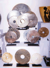 Neolithic Chinese discs known as Bis in the booth of Dallas W Boesendahl New York City
