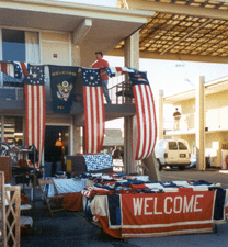 Colorful flags decorate the booth of Steve and Barbara Jenkins Fiddlers