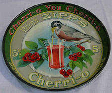Magnificent condition and brilliant colors made this 1920s Zipps CherriO beverage tray at 725 a standout at Muddy River Trading Companys booth