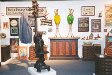 At Kim and Mary Kokles Garland Tex the hall tree with cubs was 9500 and the apothecary display jars circa 1885 were 10500