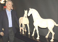 Dont break them gasped a bystander as Peter Rosenberg of Vallin Galleries Wilton Conn posed with the large Tang pottery horses he had just sold