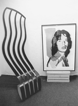 At the shows entrance Andy Warhols Mick Jagger and Allen Spiegels Chair Sculpture