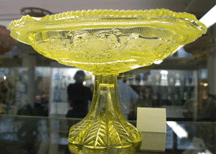 A classic treasure of American glass this Sandwich glass princess feather medallion compote in canary yellow was offered by Art and Kathy Green